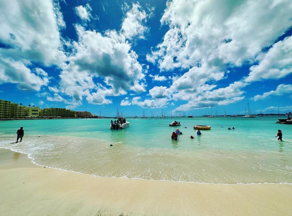 Simpson Bay Beach, one of the largest beaches in Sint Maarten, offers a stunning stretch of sandy white shores along the picturesque Simpson Bay. Visitors can enjoy the tranquility of the beach and marvel at the impressive yachts dotting the vibrant lagoon views. The Hills Vacation Rentals in Sint Maarten provide an unparalleled luxury experience. With exquisite accommodations and top-notch amenities, guests can indulge in ultimate comfort and serenity. Book your stay now and embark on a memorable vacation in paradise.